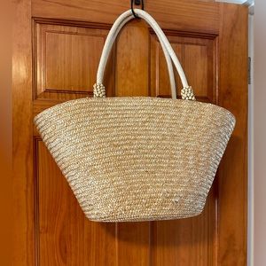 Cappelli straw tote bag. Can be used for day to day or the beach. Gently used.